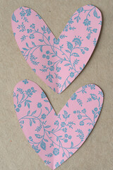 Wall Mural - two pink paper hearts with floral decorative print