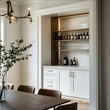 © anspar - interior design shot built in bar station as part of kitchen and dining room white walls warm white cabinetry modern sophisticated style