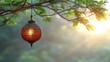 © PANGERANDESIGN - Ornate lantern hanging from tree branch at sunset.
