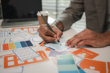 UX graphic designer planning application process development prototype, software development team, copy space, collaboration UX developer and UI designer, team analyzing mobile app interface