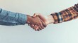 © Surachetsh - A close up shot of two individuals shaking hands, symbolizing agreement and partnership, with soft lighting emphasizing professionalism.