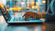 © KeetaKawee - Close-up View of Hands Typing on Laptop with Digital Data Visualization and Bokeh Effect in the Background of Modern Workspace