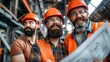 © Philipp - Construction crew analyzing blueprints under sunlight on building site with reflective helmets