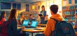 © mandesign_creative - Students attentively listen to a teacher in a sunlit classroom library, using laptops for learning.