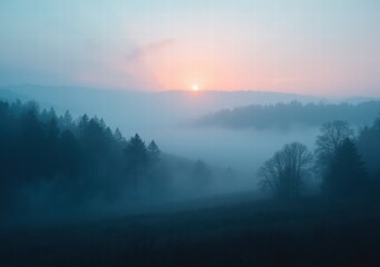 Wall Mural - Mountain landscape at dawn with fog and soft morning light over the trees