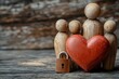 © Aleksandr - Wooden figures representing family with heart and lock symbolizing love and security