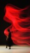 © Sergey - Dancer silhouette with vibrant red light trails
