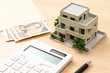 © years - 住宅模型とお金と電卓