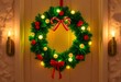 © Waranya - wreath with lights and decorations on a door.