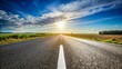 © Arnada - Empty Asphalt Road, Clear Sky, White Lines - Stock Photo