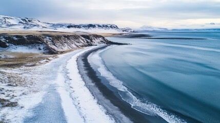 Aufkleber - Aerial view of a winter beach with white sand and ocean waves creating serene coastal scenery for text placement and marketing use.