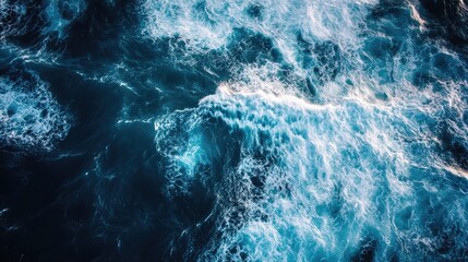 Leinwandbilder - Aerial perspective of deep blue ocean waves creating a dynamic textured background ideal for text and graphic overlay applications