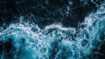 Leinwandbilder - Aerial view of ocean waves crashing creating dynamic textures with ample negative space for creative text or advertising placement