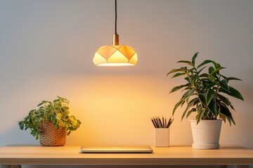 Wall Mural - A cozy workspace featuring a stylish pendant lamp, a wooden desk, and vibrant indoor plants creating a warm ambiance.