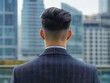 © BrandwayArt - Man in suit gazes at city skyline from rooftop terrace in urban area