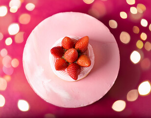 Wall Mural - delicious strawberry cake on wood background