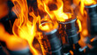 © Nakarin - Close up of burning pistons with vibrant flames and metallic surfaces