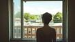 © yang - Single person gazing thoughtfully through a window, reflecting on solitude and introspection, capturing the essence of personal contemplation and inner peace.
