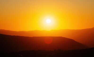 Poster - Golden sunset over mountain range