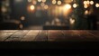 © Johannes - Empty wooden table in front of blurred cafe bar or restaurant. Abstract lights bokeh background, front view, free space for your product.