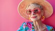 © Elena - Happy and funny cool old lady with fashionable clothes