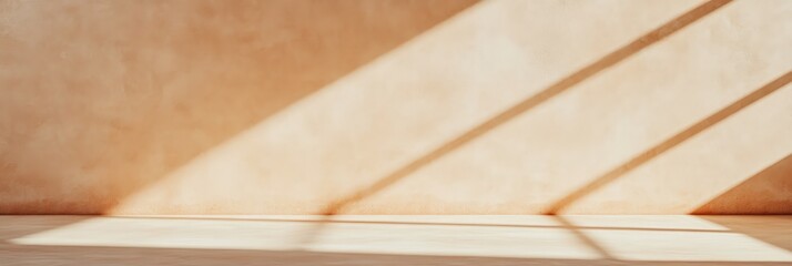 Poster - Sunlight is streaming through a window, creating beautiful shadows on the wall and floor of an empty room, perfect for showcasing products or designs
