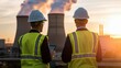 © tilialucida - Engineers observing power plant operations at sunset
