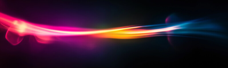 Fototapete - Abstract light trails flowing across dark background