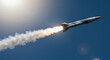 © Tuncay Öztürk - Missile Launch, Rocket Ascending, Fiery Exhaust Trail Against Blue Sky