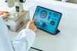© metamorworks - tablet, research, microscope, woman, screen, dx, digital transformation, analysis, graph, chart, medical, science, inspection, data, ai, digital, cloud, app, erp, business, information, pharmaceutical