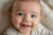 © Marina Shvedak - Adorable two-month-old baby smiling and expressing pure joy, capturing the essence of early childhood happiness
