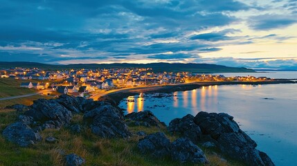 Wall Mural - Breathtaking Seaside Town at Dusk with Panoramic Mountain Views and Glimmering Lights Reflecting in the Calm Sea