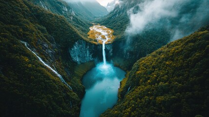 Wall Mural - Breathtaking Waterfall Cascading Down Lush Green Mountain Gorge In Tropical Wonderland