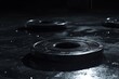 © tolem929 - Close-up of weight plates on dark gym floor.
