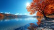 © Arifin Studio - Vibrant autumn foliage reflected in a calm lake under a bright sun.
