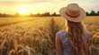 © JOKO STUDIO - Woman in wheat field at sunset, enjoying nature, summer peace