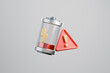 © Westend61 - Low battery symbol with warning icon over gray background