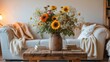 © Den Boro Day - Living room interior featuring a vibrant bouquet of flowers on a wooden table with cozy decor and soft lighting ambiance