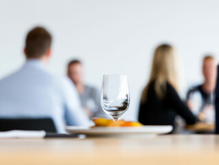 minimalist dining setup featuring glass and plate in health restaurant