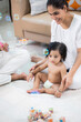 © Royaltyfreecliick - parent and child playing with toys