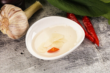 Wall Mural - Vietnamese spicy vinegar with garlic