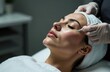 © Sergei - A woman performs a skin care procedure, free space for text on the side
