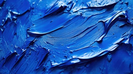 Poster - Bright cobalt blue textured surface with smooth swirls and raised areas creating a dynamic visual effect