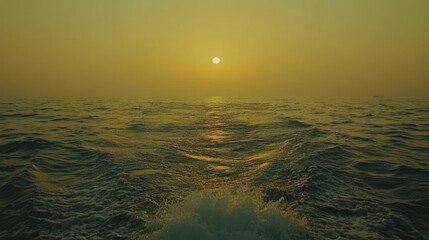 Aufkleber - A serene sunset over calm ocean waters, creating a tranquil and reflective atmosphere.