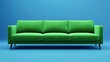 © Jersco - A sleek modern green sofa placed against a bold, vibrant blue background