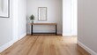 © Sigit - Modern hallway with a wooden console table and mirror.
