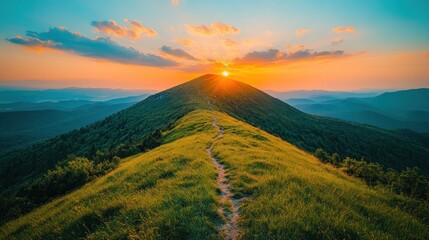 Poster - Majestic sunset over mountain peak with grassy trail.