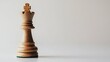 © AXYZ_STOCK - A single chess king piece standing proudly on a clean white background. The king symbolizes strategy and power in the game of chess.