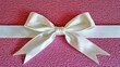 © Chaithat - Valentine's Gift Presentation with a White Satin Bow on Pink Background Romantic Decor Soft Lighting Elevated View Heartfelt Concept