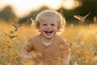 © Jenny - Joyful caucasian child playing in a sunny flower field with birds